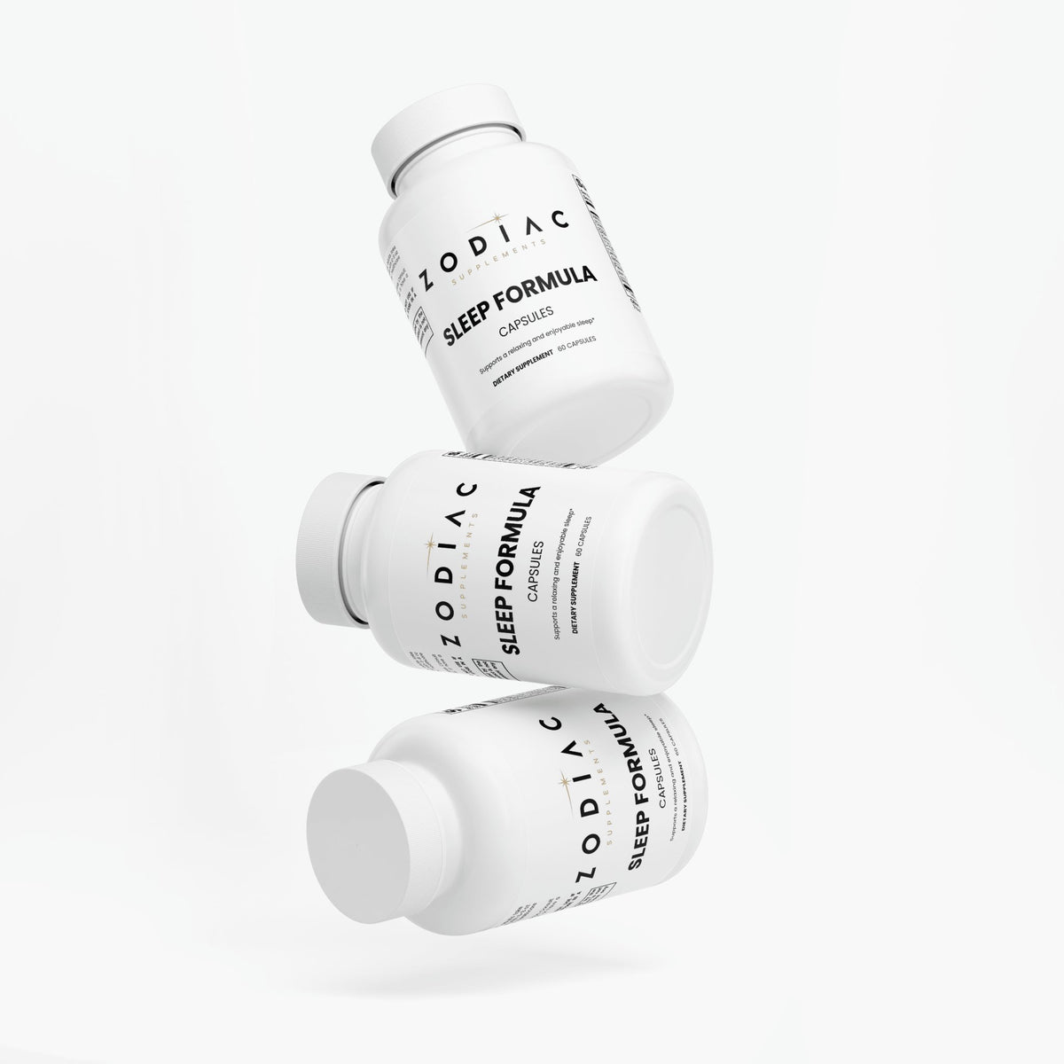 Three bottles of Zodiac Sleep Formula capsules floating against a white background, promoting restful sleep.