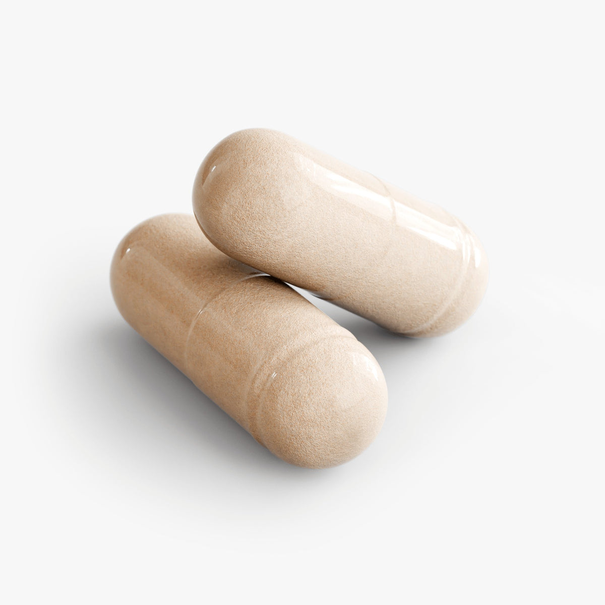 Ashwagandha capsules stacked on each other, showcasing the herbal supplement for stress relief and overall health.