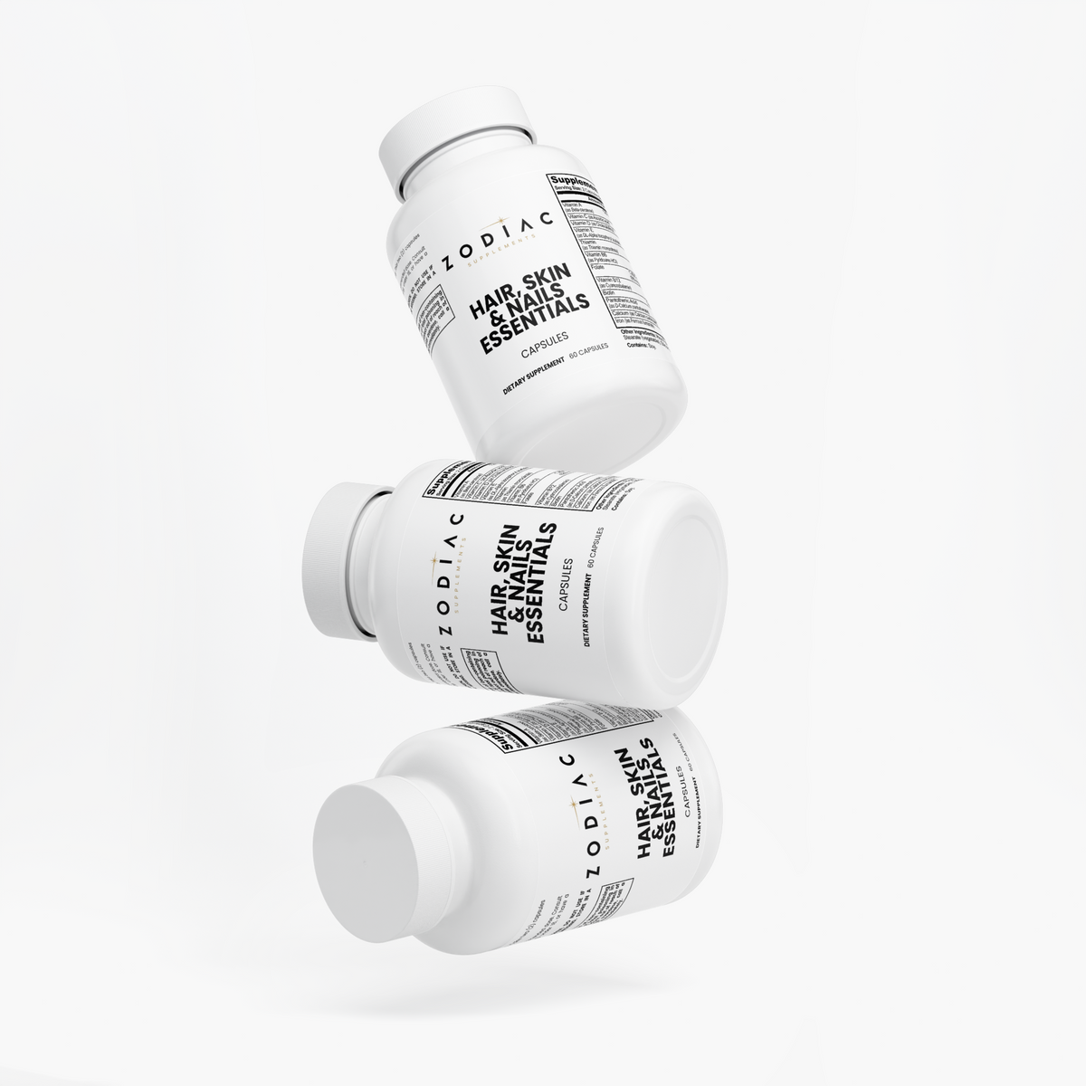 Three bottles of Hair Skin and Nails Essentials capsules from Zodiac, designed for promoting hair, skin, and nail health.