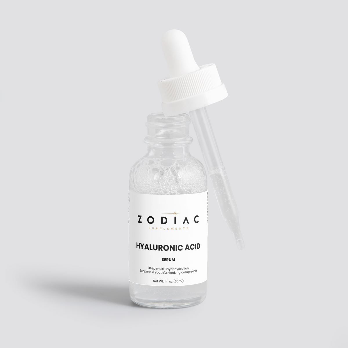 Hyaluronic Acid Serum in a clear bottle with dropper, designed for skin hydration and rejuvenation.