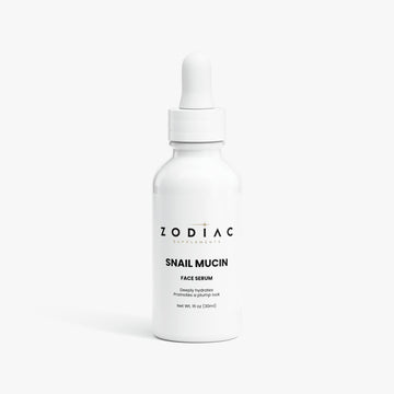 Snail Mucin Face Serum bottle with dropper, delivering deep hydration and promoting a smooth, plump appearance.