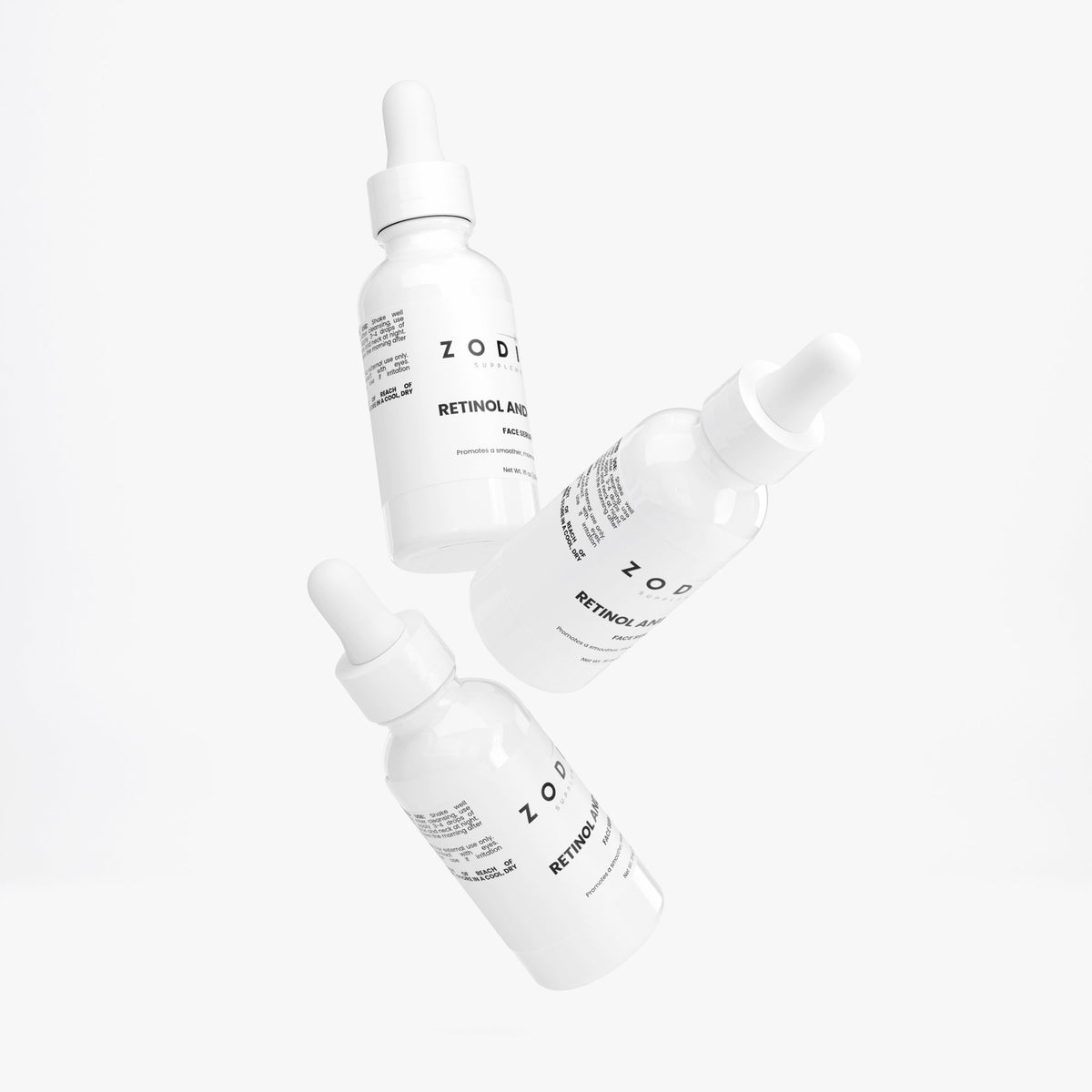 Three bottles of Retinol and Peptide Face Serum floating in a clean, white background.