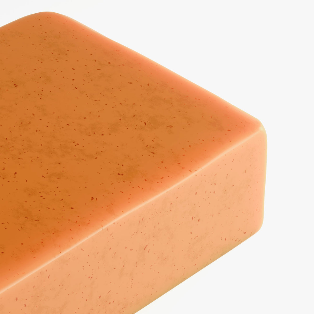 Kojic Acid & Turmeric Soap bar with a smooth, orange surface highlighting its nourishing ingredients.