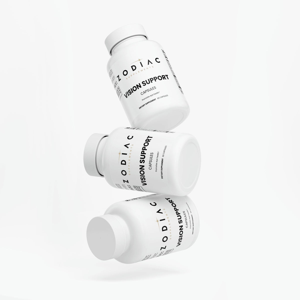 Three bottles of Zodiac Vision Support capsules stacked to promote eye health and vision nutrition.
