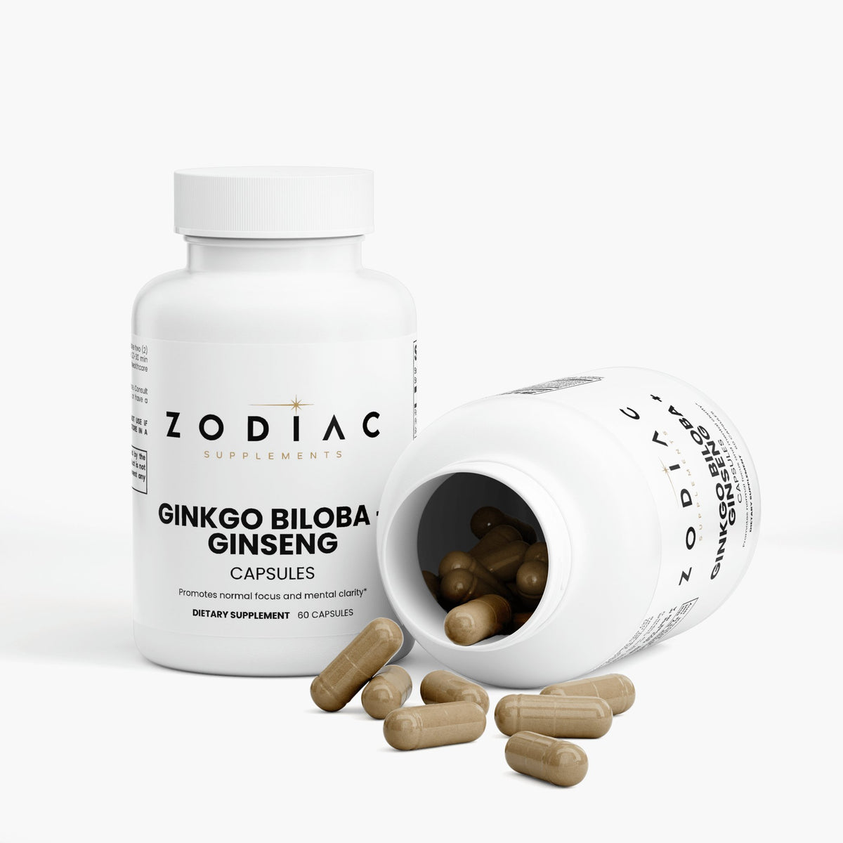 Ginkgo Biloba + Ginseng dietary supplement capsules in a bottle with some capsules spilled out.